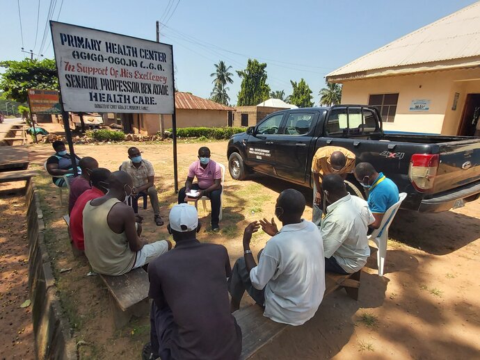 Community members gather during a listening session in Cross River State Nigeria. 