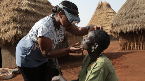 A woman has her eyes checked for trachoma in Ethiopia