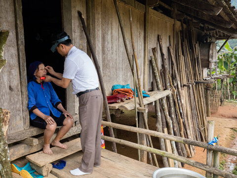 A woman has her eyes examined for trachoma in Vietnam. 