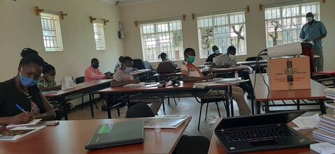 Village health teams in Uganda are trained before treatment campaigns begin, including new training on COVID-19 protocols.  