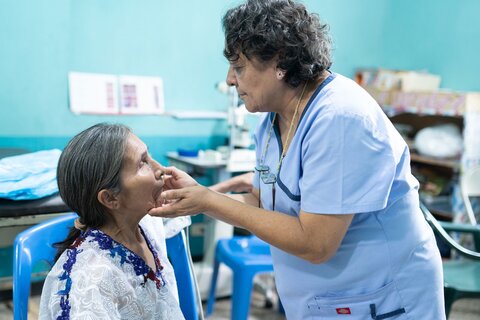 A woman has her eyes examined for trachoma in Sololá, Guatemala.