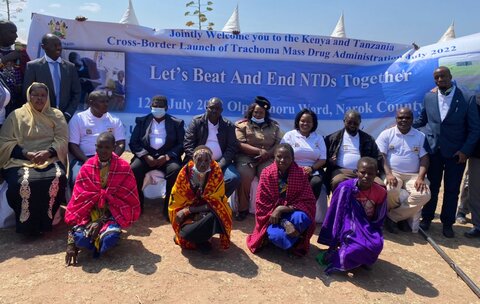 Representatives from Kenya and Tanzania gather at the first-ever coordinated launch of trachoma mass drug administration along their borders. 