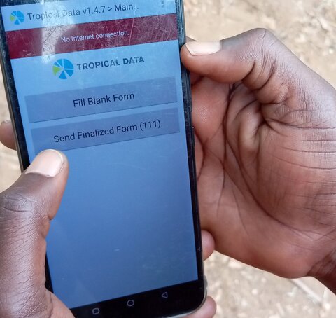 Gilbert uses the Tropical Data app during a trachoma survey in Tanzania. Photo courtesy of Gilbert Mrema