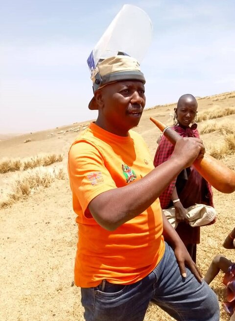 Gilbert Mrema takes a break during a trachoma survey in Tanzania. Photo courtesy of Gilbert Mrema