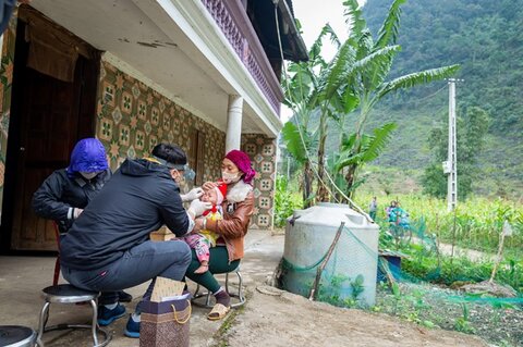 A young child has their eyes examined for trachoma during a survey in Ha Giang province, Vietnam. Photo: The Fred Hollows Foundation