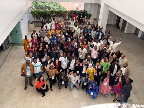 Participants gather for a global 'training of trainers' event in Nairobi, Kenya, using the newest photo-based training methods. Photo credit: RTI International