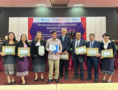 Representatives from Lao PDR’s Ministry of Health NTD team alongside partners from RTI International and FHI 360 at the celebration event in Attapeu.  