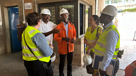 Representatives from USAID and RTI International visit with representatives from Uganda’s National Medical Stores to discuss the supply chain for NTD medicines. 